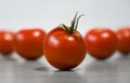 A few red ripe tomatos on a table for healthy nutrition Royalty Free Stock Photo