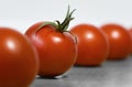 A few red ripe tomatos on a table for healthy nutrition Royalty Free Stock Photo