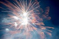 A few volleys of festive fireworks in the night sky, red-yellow. Royalty Free Stock Photo