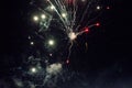 A few volleys of festive fireworks in the night sky, red-yellow. Royalty Free Stock Photo