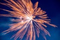 A few volleys of festive fireworks in the night sky, red-yellow. Royalty Free Stock Photo