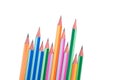 Few wood pencil crayons of different colors arranged in a wonderful line on a paper Royalty Free Stock Photo