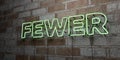 FEWER - Glowing Neon Sign on stonework wall - 3D rendered royalty free stock illustration