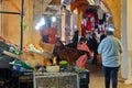 Fez, Morocco - December 07, 2018: chickens eating in the middle of a street in the medina of fez