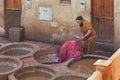 FEZ, MOROCCO - FEBRUARY 18, 2017: An unidentified workers in the tannery souk of weavers, in Fez, Morocco Royalty Free Stock Photo