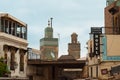 Fez, Morocco - hotels, restaurants, and minarets of Marinid Bou Inania Madrasa from the Bab Bou Jeloud city gate. Inside ancient