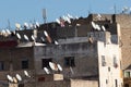 Fez, Morocco, 01/02/2020 many satellite dishes on roofs of buildings against sky Royalty Free Stock Photo