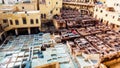 Fez, Morocco - November 12, 2019: Dye reservoirs and vats in traditional tannery of city Royalty Free Stock Photo