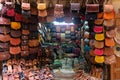 Fez, Morocco - small shop selling local leather goods at Fes el Bali market.