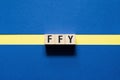 FFY - Fend For Yourself word concept on cubes