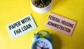 FHA credit paper on yellow background with clock and cactus Royalty Free Stock Photo