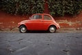 A Fiat 500 parked in Rome, Italy.