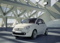 Fiat 500 city car in the middle of building environment. Royalty Free Stock Photo