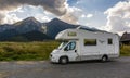 Fiat Ducato in a campervan version in the parking lot against the backdrop of the Belianske Tatras