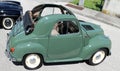 Fiat 500 Topolino, vintage car from the Thirties in a roadside parking lot