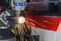 The fiber laser cutting machine cutting the steel pipe Royalty Free Stock Photo