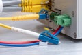 Fiber optic cable and network ethernet patch cord connect to the switch Royalty Free Stock Photo