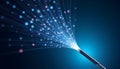 Fiber optic cable transmitting glowing light particles and data streams on a dark blue background Royalty Free Stock Photo