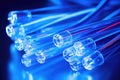 fiber optic cables against blue background Royalty Free Stock Photo
