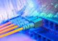 Fiber Optic cables connected to an optic ports Royalty Free Stock Photo