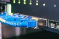 Fiber optic internet wires are connected to the ports of an access network switch. The modules for high-speed server interface are Royalty Free Stock Photo