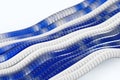 Fiber optic network cable abstract 3d background of glass and plastic wave lines. Blue and white curve threads with silver steel Royalty Free Stock Photo