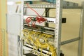 fiber optic in server room close up. Many wires connect to the network interfaces of powerful Internet servers. Children`s serve Royalty Free Stock Photo