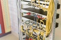 fiber optic in server room close up. Many wires connect to the network interfaces of powerful Internet servers. Children`s serve Royalty Free Stock Photo