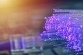 Fiber optics in magenta, close up with ethernet and keyboard background, warm lens flare Royalty Free Stock Photo