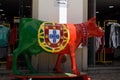 Painted cow sculpture.