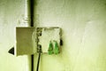 The fibre optic plug mounting on the wall matrix color toned Royalty Free Stock Photo