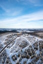 Fichtelberg highest mountain in Erzgebirge in winter aerial view photo portrait format in Oberwiesenthal, Germany Royalty Free Stock Photo
