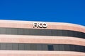 FICO logo sign on headquarters facade of Fair Isaac Corporation FICO in Silicon Valley. FICO is a data analytics company focused o