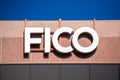 FICO logo sign on headquarters facade of Fair Isaac Corporation FICO in Silicon Valley. FICO is a data analytics company focused o