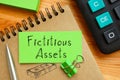 Fictitious assets is shown on the business photo using the text