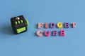 Fidget Cube stress reliever, Fingers Toy on a blue background