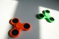 Fidget finger spinner stress, anxiety relief toy on table Royalty Free Stock Photo