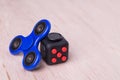 Fidget spinner and fidget cube, the latest stress relieving craze Royalty Free Stock Photo