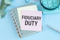 fiduciary duty text the a card. Finance and economics concept. Finance concept.