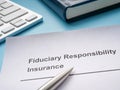 Fiduciary responsibility insurance policy and pen.