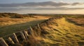 Stunning Sunset View Of Wiltshire Coast With Fence And Grass