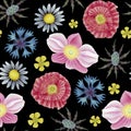 Field flowers seamless pattern with poppy, camomile, cornflower, eryngium, ranunculus, anemone flower. Hand drawn