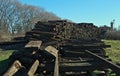 Field with giant pile of railway cross ties Royalty Free Stock Photo