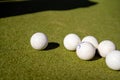 Field Hockey Balls on a Green Pitch Royalty Free Stock Photo