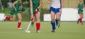 Field Hockey player, ready to pass the ball to a team mate Royalty Free Stock Photo