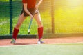 Field Hockey player, ready to pass the ball to a team mate. Hockey is a team game Royalty Free Stock Photo
