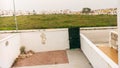 field and housing in a spanish urbanisation area Royalty Free Stock Photo