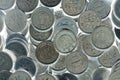 Field of Japanese coins at 1 yen. They seem to fall down. News about the economy, finances and interest rate of the central bank Royalty Free Stock Photo