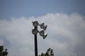 Field Lights On Partially Cloudy Day