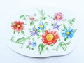 Field multicolored flowers drawn by color pencils freehand clipping on a white paper background